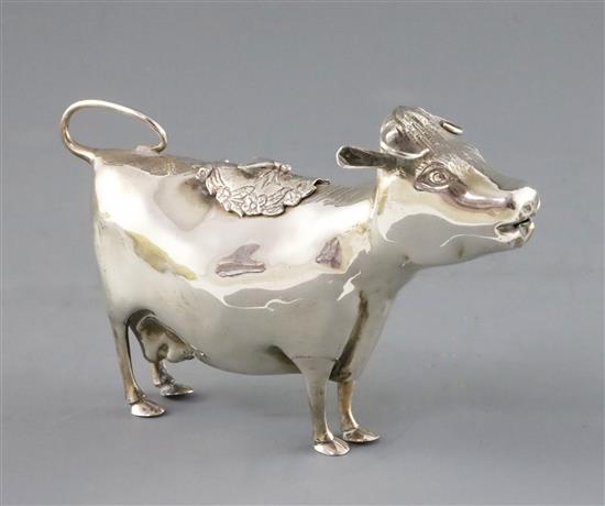 A late 1950s silver cow creamer by William Comyns & Sons Ltd, length 15.3cm.